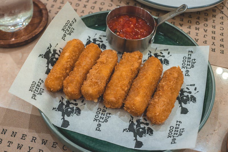 Golden fried mozzarella sticks appetizer